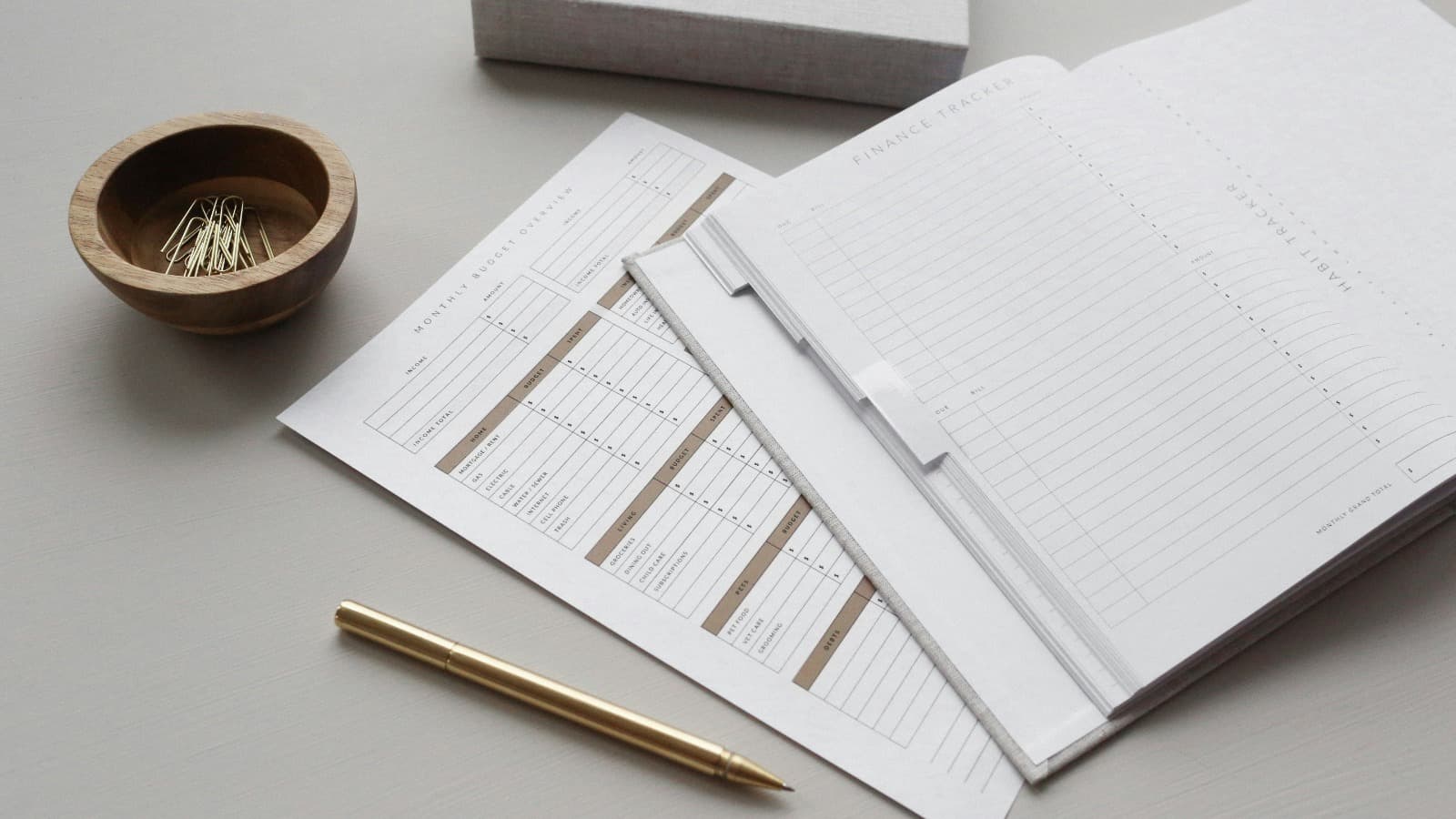 Budget tracker and finance notebook on a desk