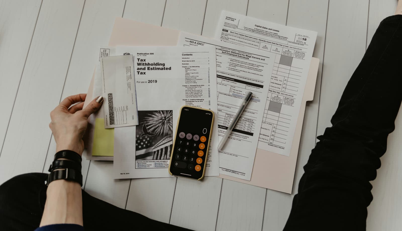 Stacks of paperwork suggesting a single-door funding bottleneck